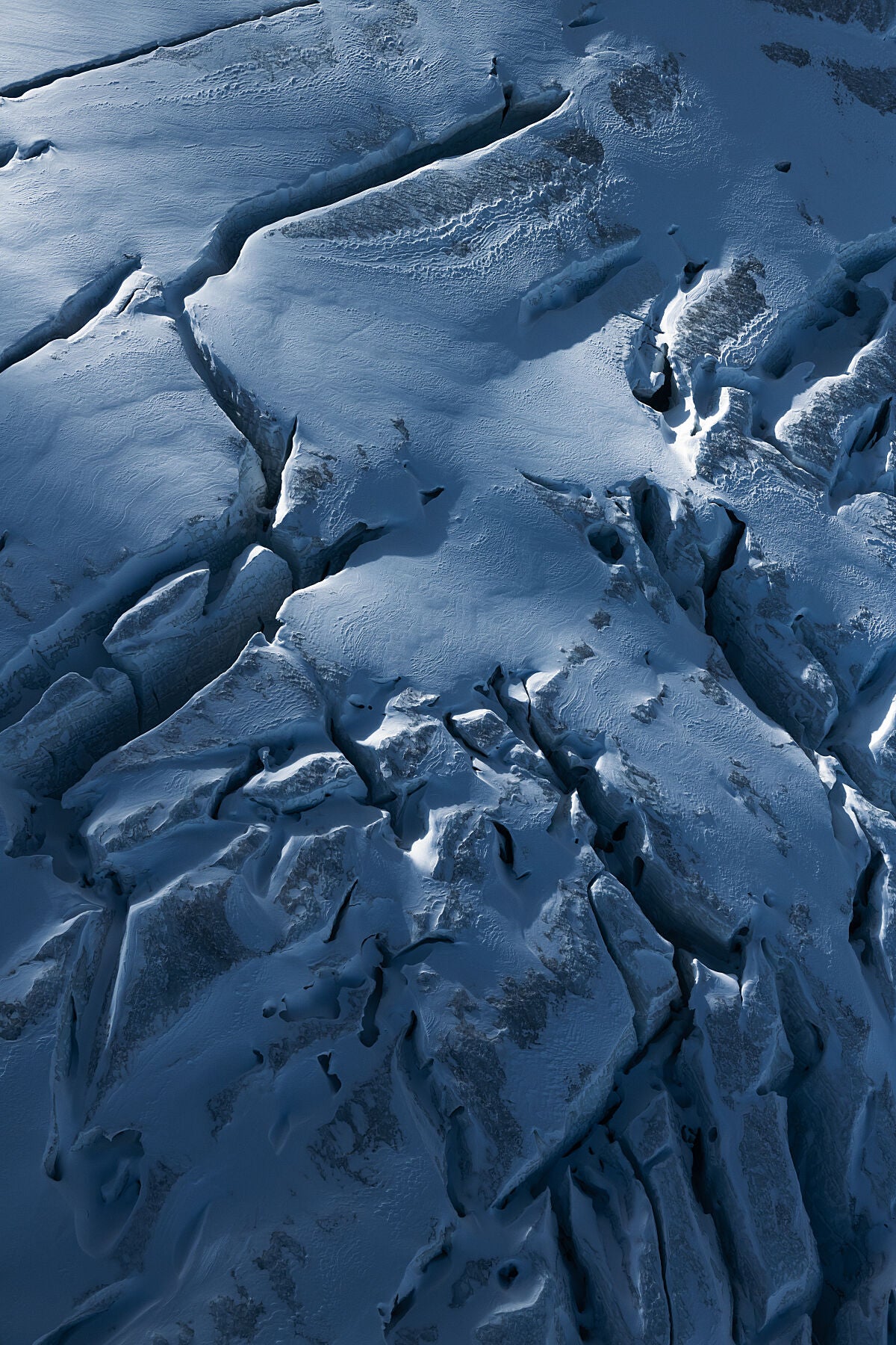 An aerial photograph of a glacier in the Purcell Mountains of British Columbia, fine art landscape print by Ashley Voykin