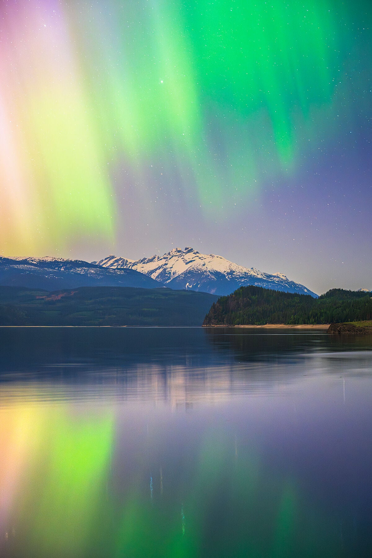 Northern lights dancing above Upper Arrow Lake near Nakusp BC, fine art landscape print from British Columbia’s West Kootenay region by Ashley Voykin