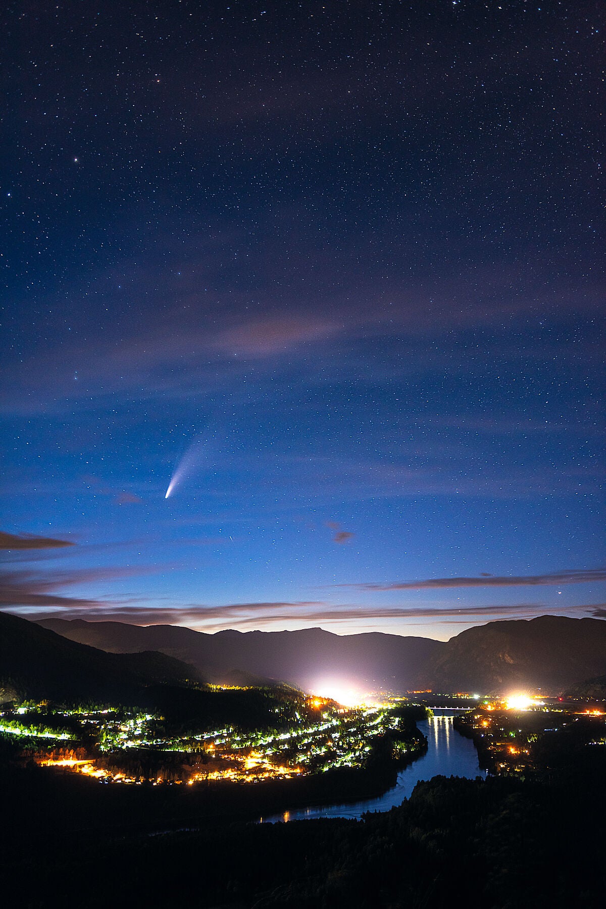 Comet NEOWISE streaking across the night sky above Castlegar, British Columbia, astrophotography by Ashley Voykin