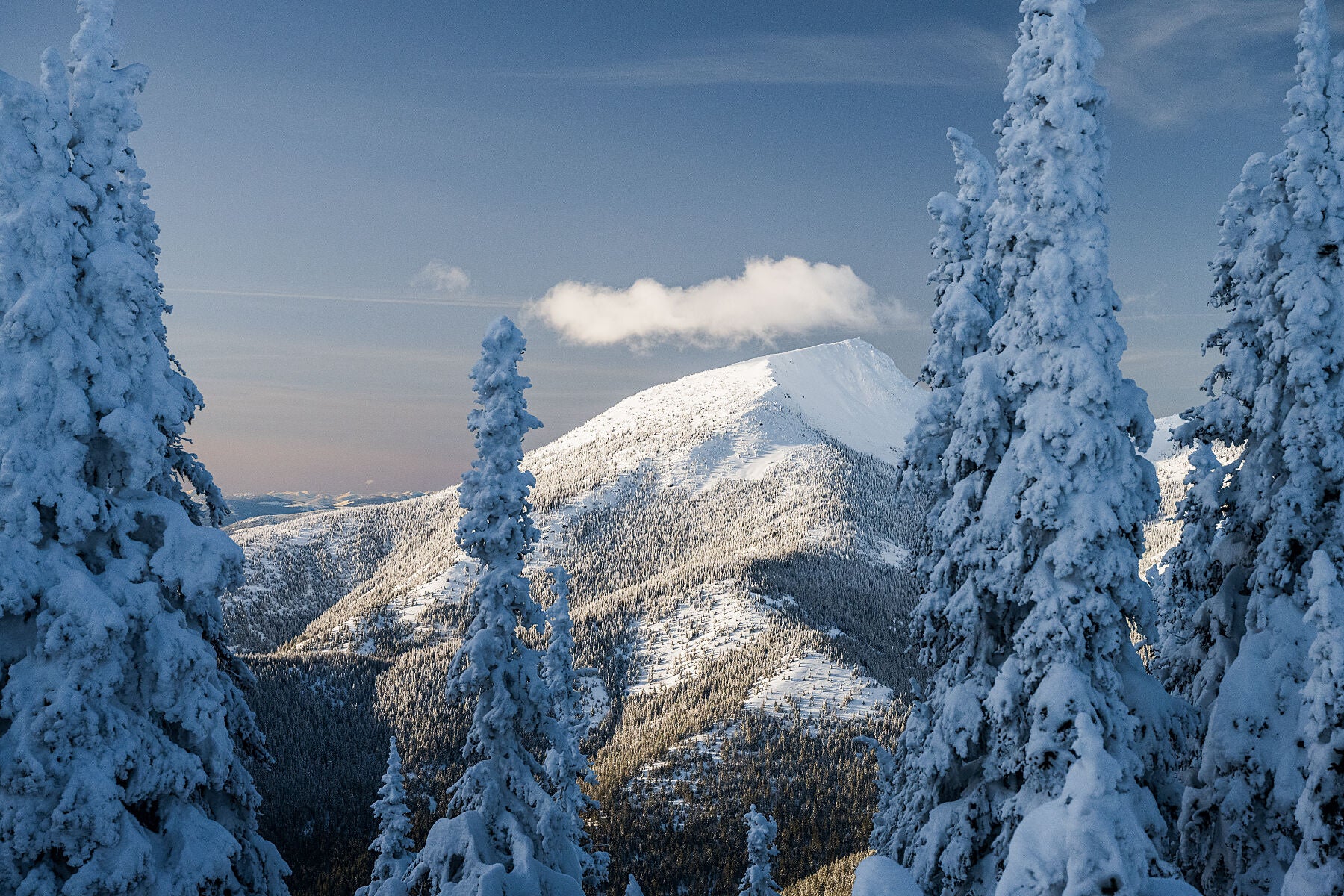 A winter scene of Old Glory peak in the Rossland Range, Mountain landscape photography by West Kootenay photographer Ashley Voykin