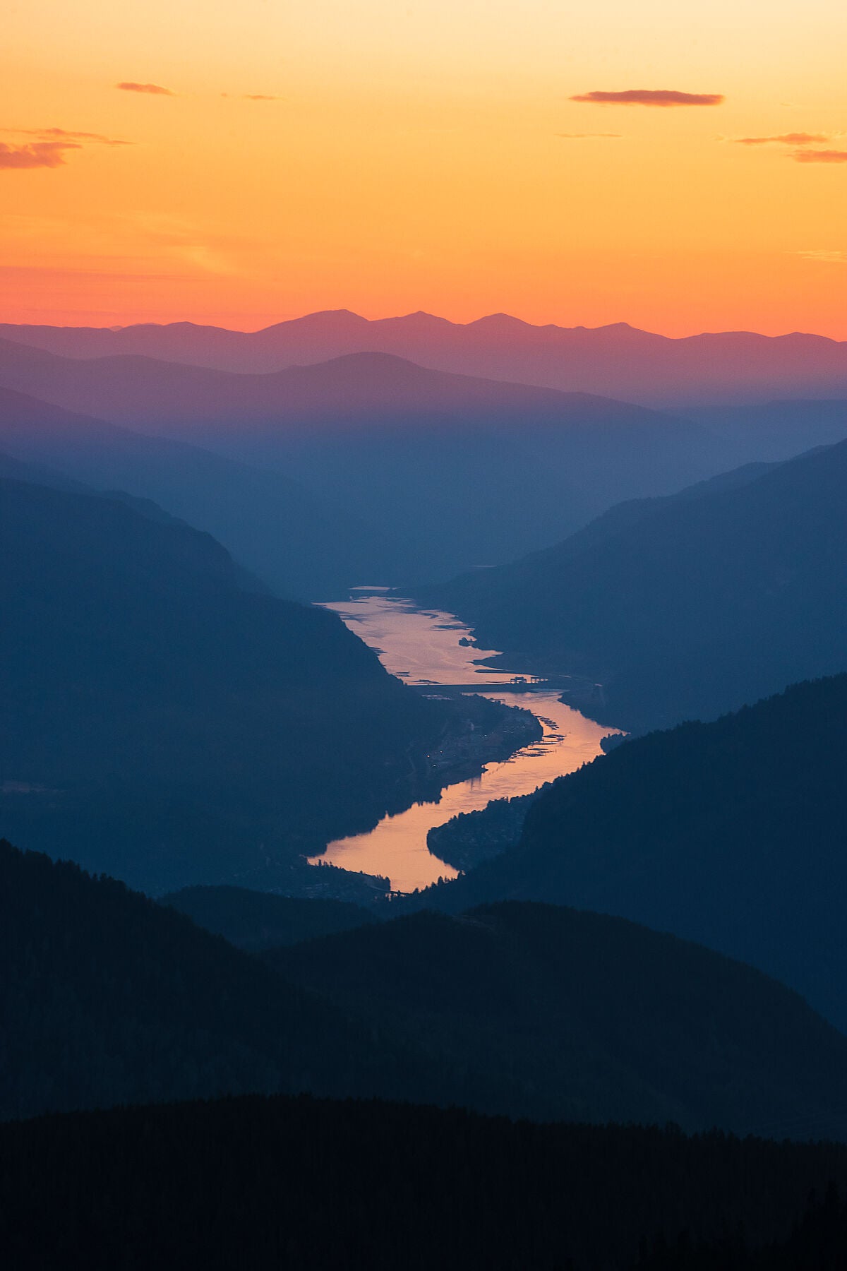 Sunset colours over Lower Arrow Lake and the Columbia River near Castlegar, captured by photographer Ashley Voykin in the West Kootenays