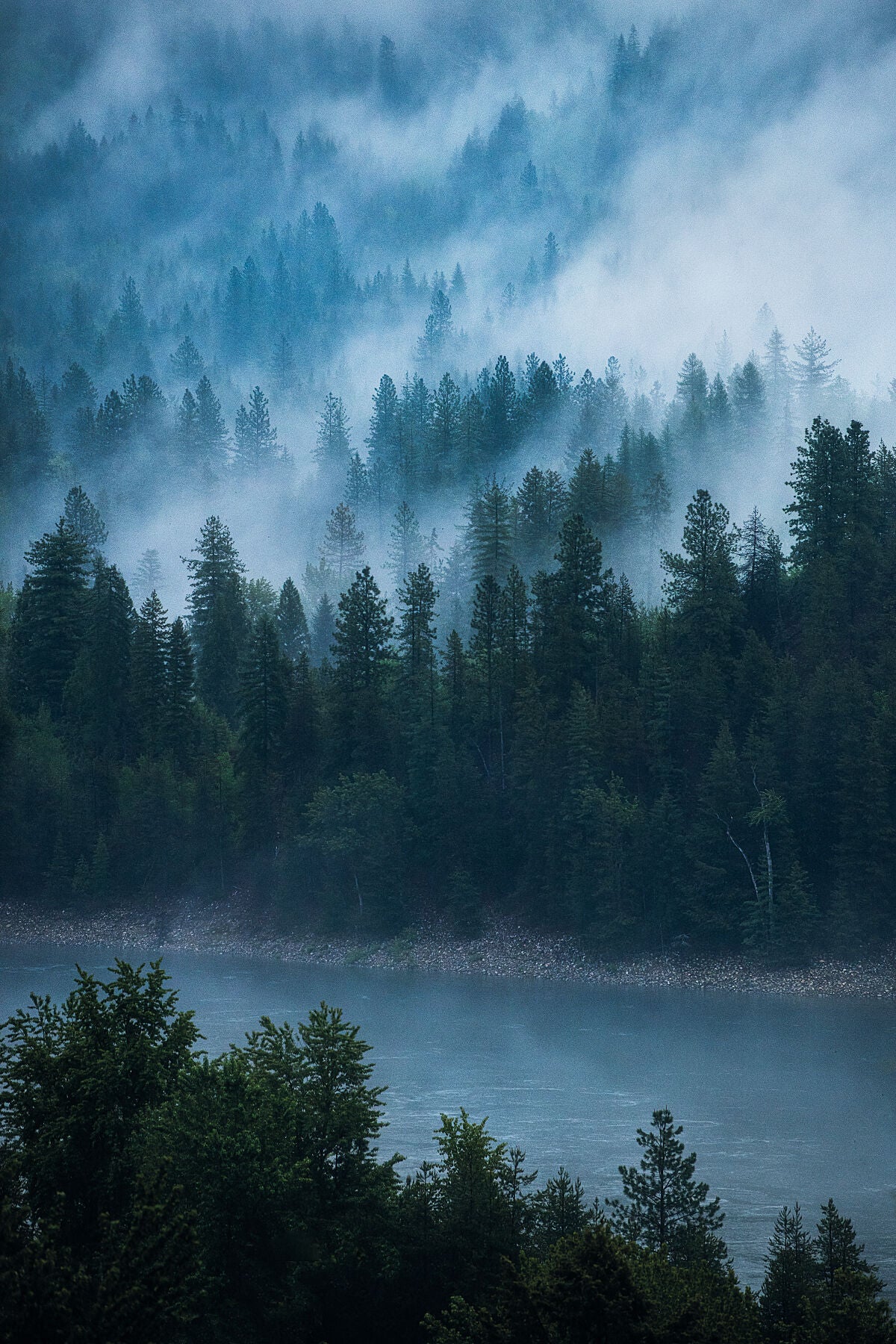 A cloudy day on the Columbia River, Genelle, in British Columbia’s Kootenay region, fine art photography by Ashley Voykin.