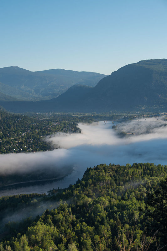 River fog from the Columbia River blankets parts of Castlegar, West Kootenay fine art print by Ashley Voykin