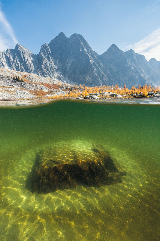 An underwater view of Monica Meadows and an alpine lake, in British Columbia's Purcell Mountain Range, Kootenay fine art photography by Ashley Voykin