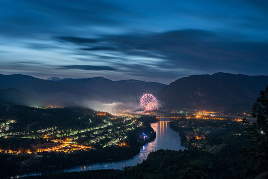 Fireworks during the annual Sunfest celebrations in Castlegar reflected onto the Columbia River, Kootenay fine art photography by Ashley Voykin