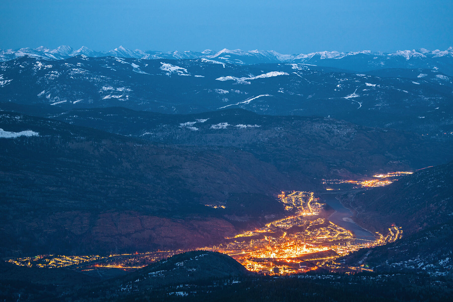 A winter view of Trail, British Columbia from RED Mountain Resort, captured by photographer Ashley Voykin in the West Kootenays